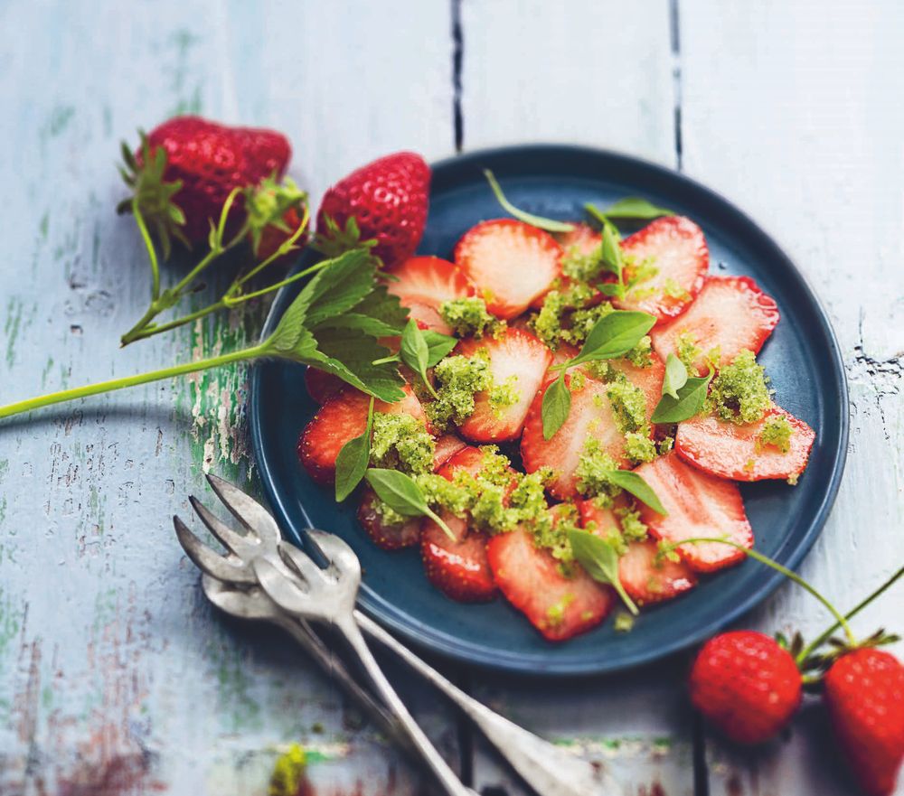 Fresh Strawberry Carpaccio with Aromatic Herb Sugar from 100 Desserts to Die For by Trish Deseine