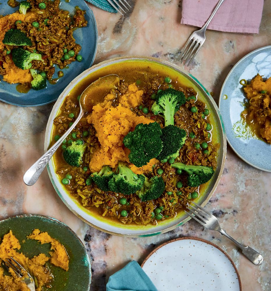 Spiced mince and gravy on swede mash with broccoli trees from East by