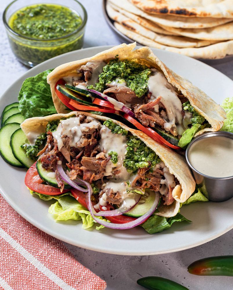 Yemeni Lamb Pita with Zhug from Epic BBQ Sandwiches: Next-Level Burgers, Melts, Sliders, Tacos, and More, Grilled or Smoked to Perfection by Brad Prose