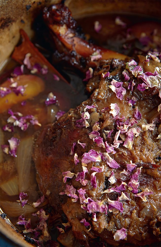 Slow—cooked lamb shoulder with plums & roses from Honey & Co Food from