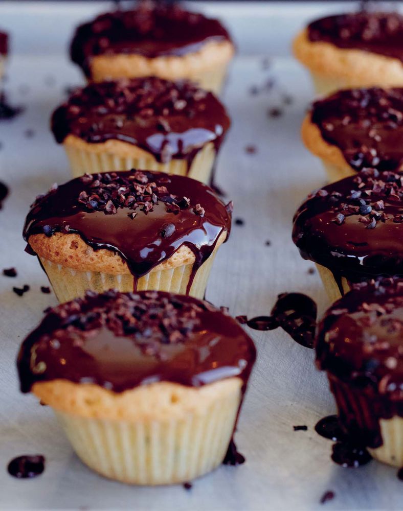 Cocoa Nib Muffins with Dark Chocolate Glaze from Huckleberry Stories, Secrets, and Recipes from