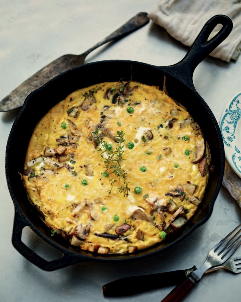Wild Mushroom Frittata with Cheddar, Green Onions, and Peas from One Pan, Two Plates: More Than 70 Complete Weeknight Meals for Two by Carla Snyder