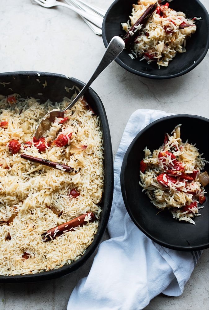 Baked rice with confit tomatoes and garlic from Ottolenghi Simple by Yotam Ottolenghi