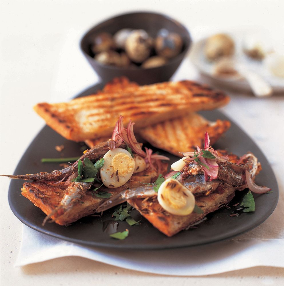 Bruschetta with Anchovies, Quail’s Eggs and Roasted Cumin from Modern Moroccan by Ghillie Basan