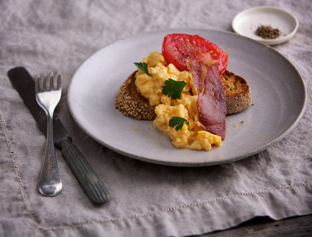 Scrambled Eggs on Toast with Crisp Pancetta and Confit Tomatoes from At