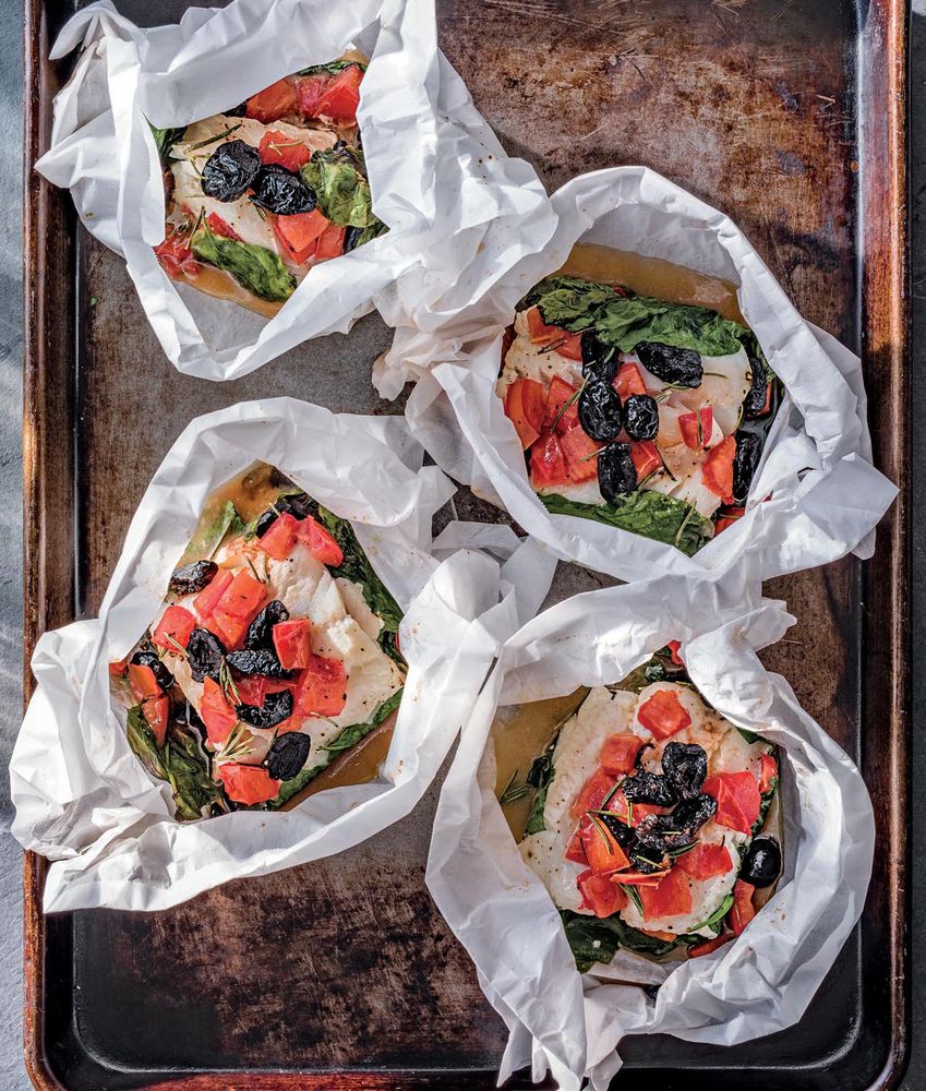 Cod in Parchment with Tomatoes, Olives & Spinach from Sheet Pan