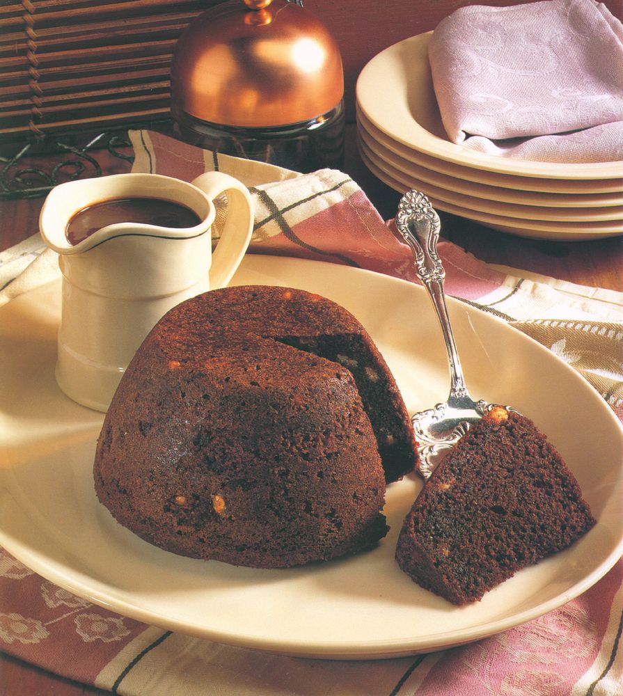 Chocolatechip pudding with chocolate sauce from Puddings Le Cordon