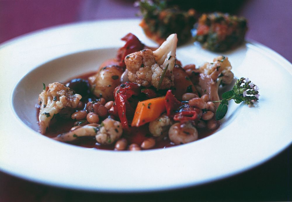 Vegetable stifado with spinach and tomato keftedes from Pure Vegetarian by Paul Gayler