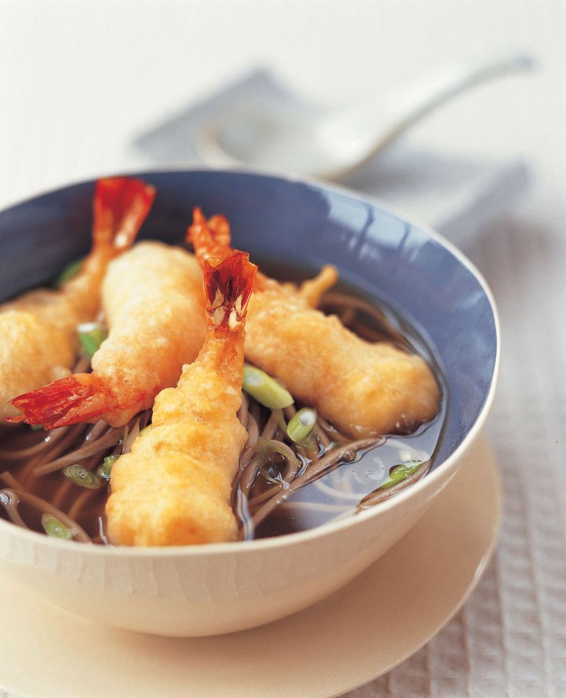 Soba noodles in hot broth with tempura prawns from Ramen by Heather Whinney