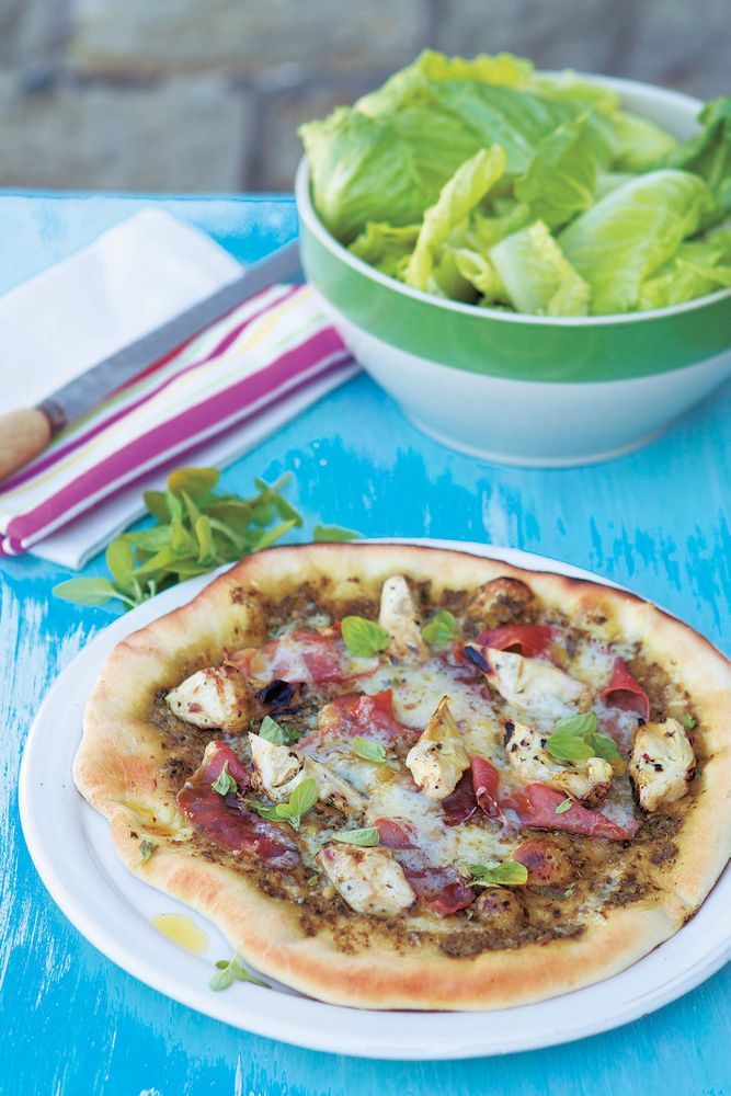 Pizza with Artichoke Hearts, Prosciutto and Basil Pesto from Woodfired