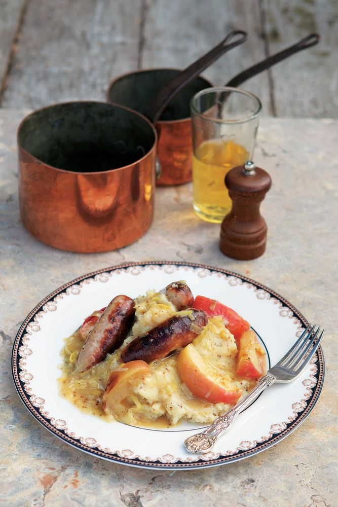 Braised Sausages with Leeks, Apples and Cider from Woodfired Oven Cookbook by Holly Jones and