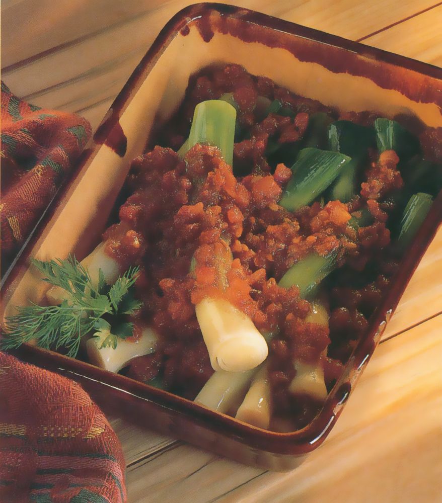 Braised Leeks with Tomatoes and Balsamic Vinegar from The Cook's Companion: A step-by-step guide to cooking skills including original recipes by Josceline Dimbleby