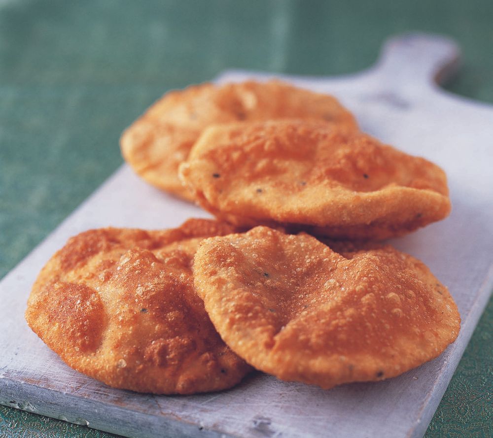 Deep-fried puffed bread from The Complete Indian Regional Cookbook: 300 Classic Recipes from the Gre