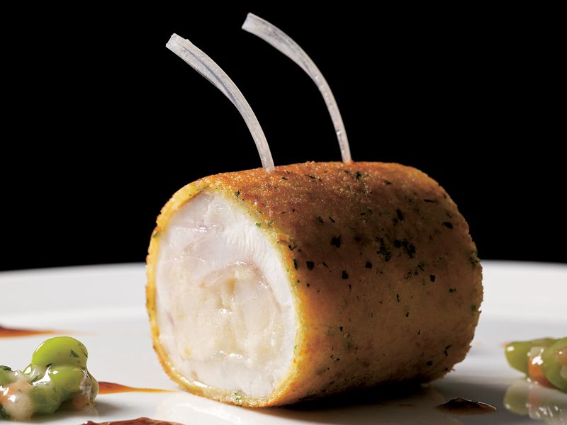 Double Chop of Striped Bass Belly En Persillade, Black-Eyed Peas, and Whole-Grain Mustard Sauce from