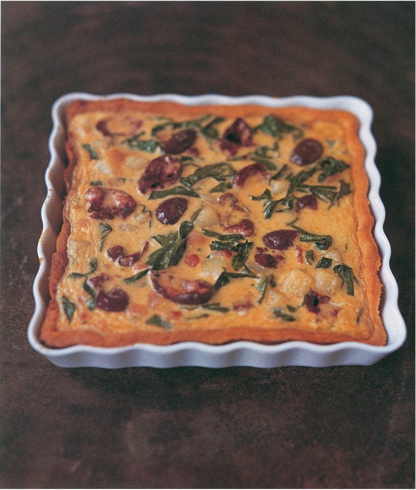 Spinach, potato, bacon and olive quiche from Vegetables The new food heroes by Peter Gordon